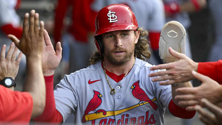 Jun 17, 2025; Chicago, Illinois, USA;  St. Louis Cardinals second baseman Brendan Donovan (33) celebrates in the dugout after he scores during the second inning against the Chicago White Sox at Rate Field. Mandatory Credit: Matt Marton-Imagn Images