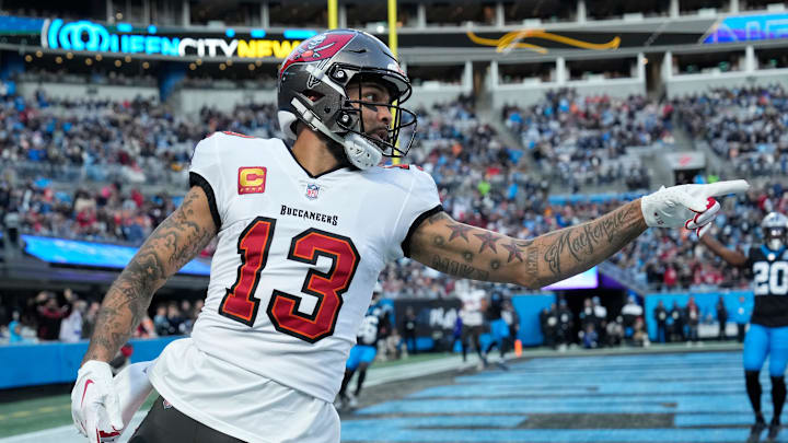 Dec 1, 2024; Charlotte, North Carolina, USA;  Tampa Bay Buccaneers wide receiver Mike Evans (13) reacts in the first quarter at Bank of America Stadium. Mandatory Credit: Bob Donnan-Imagn Images