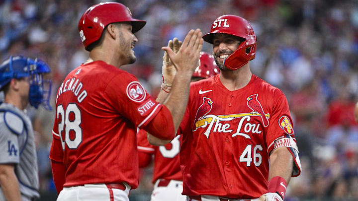 Aug 16, 2024; St. Louis, Missouri, USA; St. Louis Cardinals first baseman Paul Goldschmidt (46) celebrates with third baseman Nolan Arenado (28) after hitting a two-run home run against the Los Angeles Dodgers during the second inning at Busch Stadium. Mandatory Credit: Jeff Curry-Imagn Images Aug 16, 2024; St. Louis, Missouri, USA; St. Louis Cardinals first baseman Paul Goldschmidt (46) celebrates with third baseman Nolan Arenado (28) after hitting a two-run home run against the Los Angeles Dodgers during the second inning at Busch Stadium. Mandatory Credit: Jeff Curry-Imagn Images