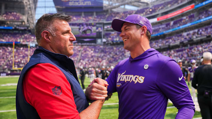 Aug 16, 2025; Minneapolis, Minnesota, USA; New England Patriots head coach Mike Vrabel and Minnesota Vikings head coach Kevin O'Connell meet after the game at U.S. Bank Stadium. Mandatory Credit: Brad Rempel-Imagn Images