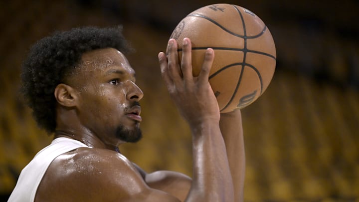 Apr 19, 2025; Los Angeles, California, USA;  Los Angeles Lakers guard Bronny James (9) warms up prior to the game against the Minnesota Timberwolves at Crypto.com Arena. Mandatory Credit: Jayne Kamin-Oncea-Imagn Images