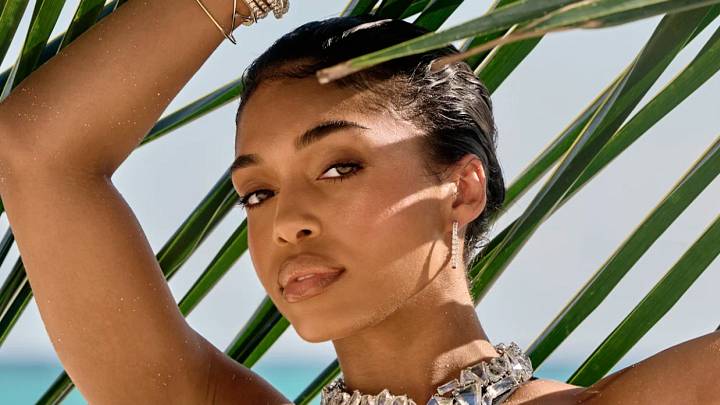 Lori Harvey was photographed by Yu Tsai in Mexico. Swimsuit by Yevrah Swim. Necklace by Swarovski. Lori Harvey was photographed by Yu Tsai in Mexico. Swimsuit by Yevrah Swim. Necklace by Swarovski.