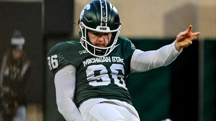 Michigan State's Ryan Eckley punts the ball against Penn State during the second quarter on Saturday, Nov. 15, 2025, at Spartan Stadium in East Lansing. Michigan State's Ryan Eckley punts the ball against Penn State during the second quarter on Saturday, Nov. 15, 2025, at Spartan Stadium in East Lansing.