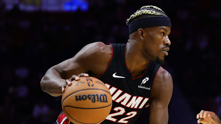 Nov 4, 2024; Miami, Florida, USA; Miami Heat forward Jimmy Butler (22) drives to the basket against Sacramento Kings forward Keegan Murray (13) during the first quarter at Kaseya Center. Mandatory Credit: Sam Navarro-Imagn Images