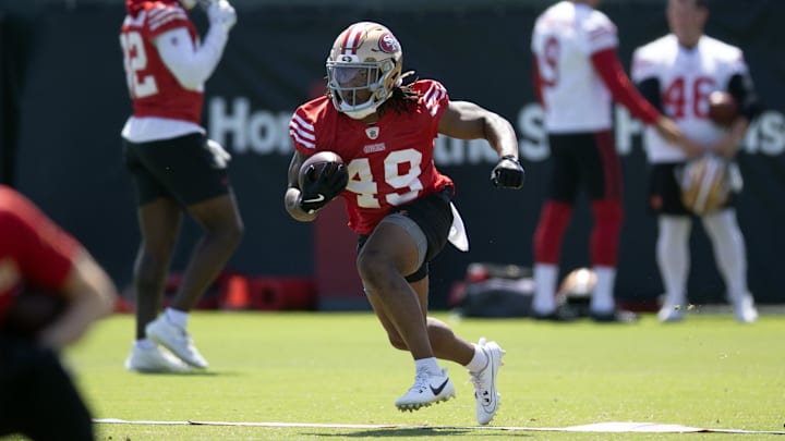 Jun 11, 2025; Santa Clara, CA, USA; San Francisco 49ers running back Corey Kiner (49) runs a play from scrimmage during a team OTA at Levi's Stadium. Mandatory Credit: D. Ross Cameron-Imagn Images Jun 11, 2025; Santa Clara, CA, USA; San Francisco 49ers running back Corey Kiner (49) runs a play from scrimmage during a team OTA at Levi's Stadium. Mandatory Credit: D. Ross Cameron-Imagn Images
