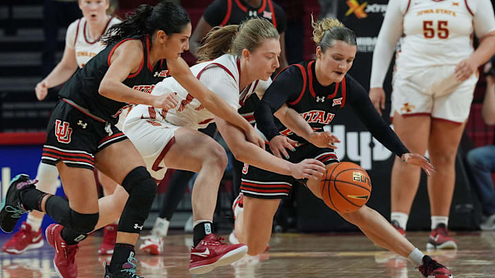 Iowa State Cyclones' guard Emily Ryan (11) and Utah Utes guard Inês Vieira (2) and Utah Utes guard Matyson Wilke (23) battle for a loose ball during the fourth quarter in the NCAA women’s basketball at Hilton Coliseum on Sunday, Jan. 5, 2025, in Ames, Iowa. Iowa State Cyclones' guard Emily Ryan (11) and Utah Utes guard Inês Vieira (2) and Utah Utes guard Matyson Wilke (23) battle for a loose ball during the fourth quarter in the NCAA women’s basketball at Hilton Coliseum on Sunday, Jan. 5, 2025, in Ames, Iowa.
