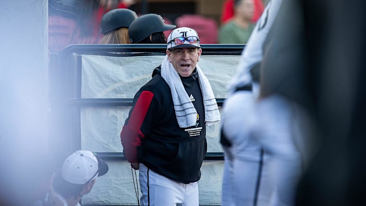 Louisville head coach Dan McDonnell yelled to his team in the dugout as the Cardinals hosted the Xavier Musketeers in Louisville's home opener of the 2024 season on Wednesday afternoon at Jim Patterson Stadium. Louisville fell to Xavier 9-1. Feb. 21, 2024