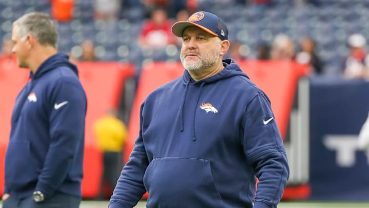 HOUSTON, TX - DECEMBER 03: Denver Broncos pass game coordinator John Morton oversees practice during the football game between Denver Broncos and Houston Texans at NRG Stadium on December 3, 2023 in Houston, Texas.