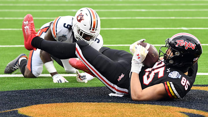 Dec 30, 2023; Nashville, TN, USA; Preston Howard (85) scores a touchdown during the 2023 Music City Bowl. He is one of two former Terrapins to rejoin Maryland via the transfer portal this offseason. Dec 30, 2023; Nashville, TN, USA; Preston Howard (85) scores a touchdown during the 2023 Music City Bowl. He is one of two former Terrapins to rejoin Maryland via the transfer portal this offseason.