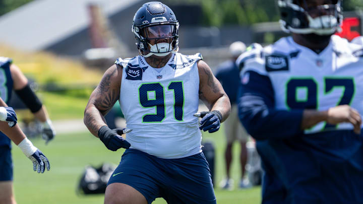 Jun 11, 2025; Renton, WA, USA; Seattle Seahawks defensive lineman Byron Murphy II (91) takes part in drills during mini-camp at Virginia Mason Athletic Center. 