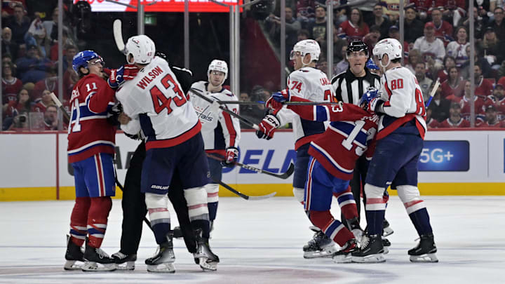 Apr 25, 2025; Montreal, Quebec, CAN; Tussles between Montreal Canadiens forward Brendan Gallagher (11) and Washington Capitals forward Tom Wilson (43) and forward Pierre-Luc Dubois (80) and Montreal Canadiens forward Cole Caufield (13) during the second period in game three of the first round of the 2025 Stanley Cup Playoffs at the Bell Centre. Mandatory Credit: Eric Bolte-Imagn Images