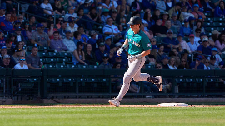 Mar 8, 2025; Mesa, Arizona, USA; Seattle Mariners infielder Colt Emerson (85) hits a home run in the top of the ninth during a spring training game against the Chicago Cubs at Sloan Park. Mandatory Credit: Allan Henry-Imagn Images Mar 8, 2025; Mesa, Arizona, USA; Seattle Mariners infielder Colt Emerson (85) hits a home run in the top of the ninth during a spring training game against the Chicago Cubs at Sloan Park. Mandatory Credit: Allan Henry-Imagn Images