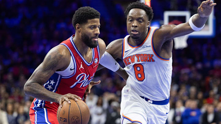 Nov 12, 2024; Philadelphia, Pennsylvania, USA; Philadelphia 76ers forward Paul George (8) drives against New York Knicks forward OG Anunoby (8) during the fourth quarter at Wells Fargo Center. Mandatory Credit: Bill Streicher-Imagn Images Nov 12, 2024; Philadelphia, Pennsylvania, USA; Philadelphia 76ers forward Paul George (8) drives against New York Knicks forward OG Anunoby (8) during the fourth quarter at Wells Fargo Center. Mandatory Credit: Bill Streicher-Imagn Images