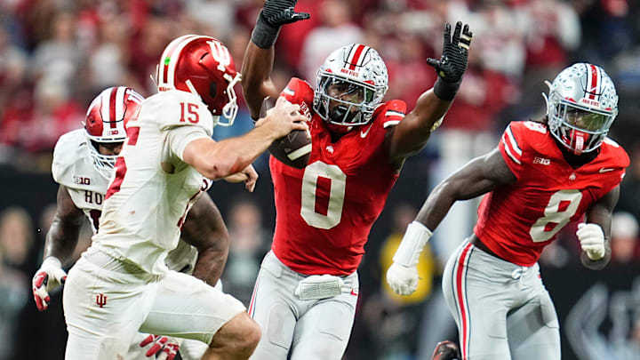 Ohio State Buckeyes linebacker Sonny Styles (0) pressures Indiana Hoosiers quarterback Fernando Mendoza (15) during the Big Ten Conference championship game at Lucas Oil Stadium in Indianapolis on Dec. 6, 2025. Ohio State lost 13-10.