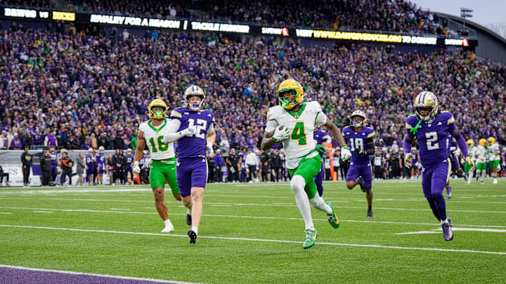 Oregon wide receiver Malik Benson breaks away for a touchdown as the Oregon Ducks take on the Washington Huskies on Nov. 29, 2025, at Husky Stadium in Seattle, Washington.