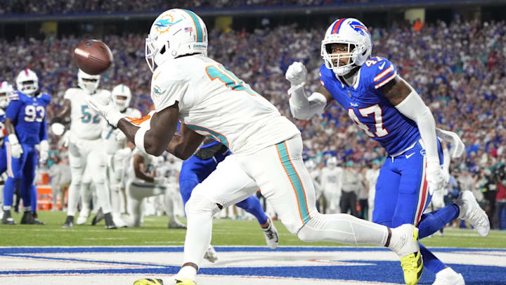 Miami Dolphins receiver Tyreek Hill makes a catch to score a touchdown against Buffalo Bills cornerback Christian Benfor.