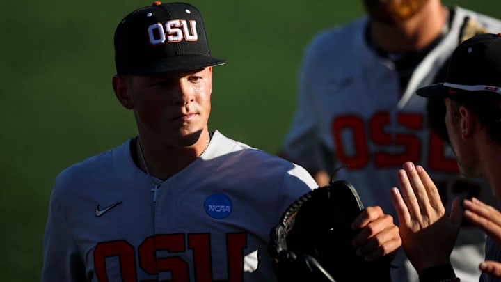 Oregon State pitcher Ethan Kleinschmit (24) walks into the dugout after striking out Florida State in game 2 of the NCAA Super Regional at Goss Stadium on Saturday, June 7, 2025 in Corvallis.