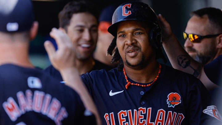 May 27, 2024; Denver, Colorado, USA; Cleveland Guardians third baseman Jose Ramirez (11) celebrates in the dugout after scoring on an RBI in the third inning against the Colorado Rockies at Coors Field. Mandatory Credit: Isaiah J. Downing-USA TODAY Sports