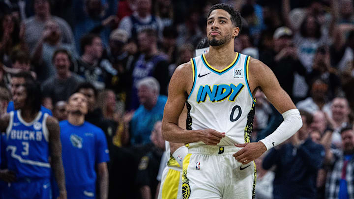 Mar 11, 2025; Indianapolis, Indiana, USA;Indiana Pacers guard Tyrese Haliburton (0) celebrates his made basket and foul  in the second half against the Milwaukee Bucks  at Gainbridge Fieldhouse. Mandatory Credit: Trevor Ruszkowski-Imagn Images
