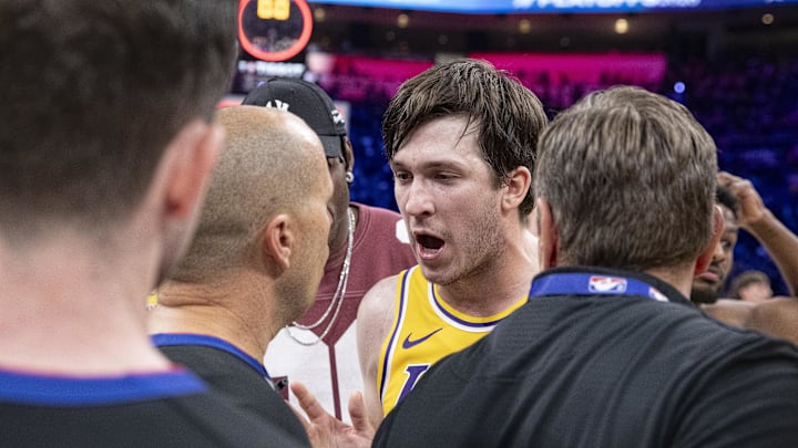 May 7, 2026; Oklahoma City, Oklahoma, USA; Los Angeles Lakers guard Austin Reaves (15) talks to an referee John Goble mid court after the end of game two of the second round of the 2026 NBA Playoffs against the Oklahoma City Thunder at Paycom Center. Mandatory Credit: Alonzo Adams-Imagn Images