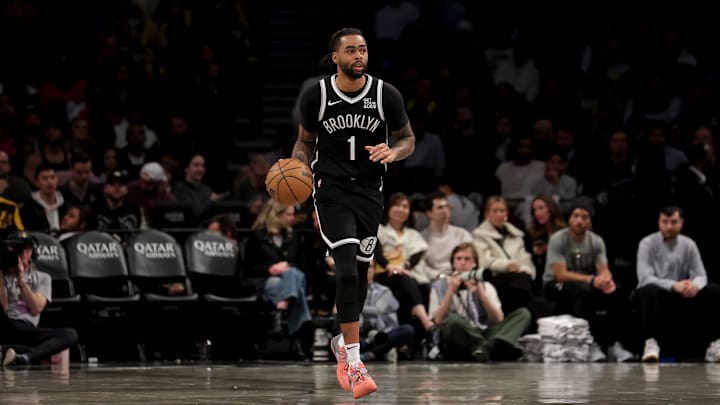 Mar 10, 2025; Brooklyn, New York, USA; Brooklyn Nets guard D'Angelo Russell (1) brings the ball up court against the Los Angeles Lakers during the third quarter at Barclays Center. Mandatory Credit: Brad Penner-Imagn Images