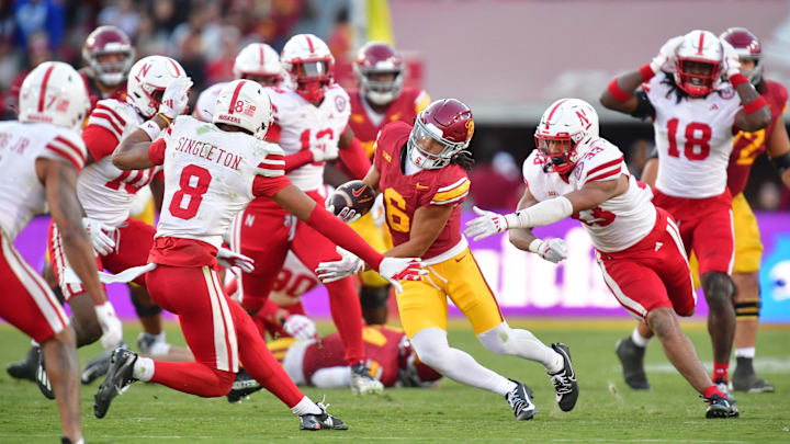 Nov 16, 2024; Los Angeles, California, USA; Southern California Trojans wide receiver Makai Lemon runs the ball against the Nebraska Cornhuskers defense during the second half at the Los Angeles Memorial Coliseum. Nov 16, 2024; Los Angeles, California, USA; Southern California Trojans wide receiver Makai Lemon runs the ball against the Nebraska Cornhuskers defense during the second half at the Los Angeles Memorial Coliseum.