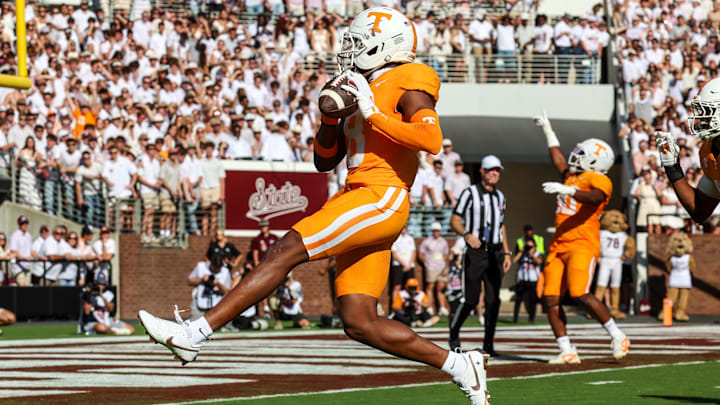Sep 27, 2025; Starkville, Mississippi, USA; Tennessee Volunteers defensive back Colton Hood (8) scores a touchdown after an interception against the Mississippi State Bulldogs during the first half at Davis Wade Stadium at Scott Field. Mandatory Credit: Wesley Hale-Imagn Images