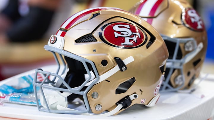 Jan 5, 2025; Glendale, Arizona, USA; Detailed view of a San Francisco 49ers helmet at State Farm Stadium. Mandatory Credit: Mark J. Rebilas-Imagn Images