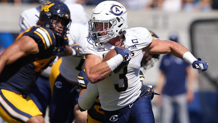  UC Davis Aggies running back Lan Larison (3) carries the ball against the California Golden Bears during the second quarter at California Memorial Stadium.