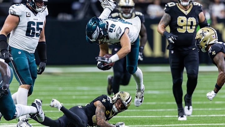 Sep 22, 2024; New Orleans, Louisiana, USA; New Orleans Saints safety Tyrann Mathieu (32) tackles Philadelphia Eagles tight end Dallas Goedert (88) during the first half at Caesars Superdome. Mandatory Credit: Stephen Lew-Imagn Images