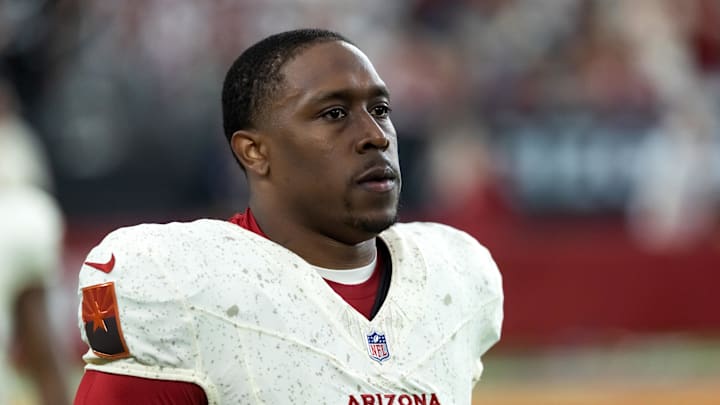 Sep 25, 2025; Glendale, Arizona, USA; Arizona Cardinals running back Emari Demercado (31) against the Seattle Seahawks at State Farm Stadium. Mandatory Credit: Mark J. Rebilas-Imagn Images