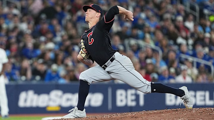 May 3, 2025; Toronto, Ontario, CAN; Cleveland Guardians relief pitcher Kolby Allard (49) throws a pitch against the Toronto Blue Jays during the eighth inning at Rogers Centre. Mandatory Credit: Nick Turchiaro-Imagn Images