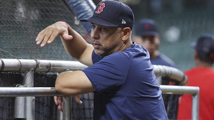 Boston Red Sox manager Alex Cora (13) talks before the game against the Houston Astros at Minute Maid Park.
