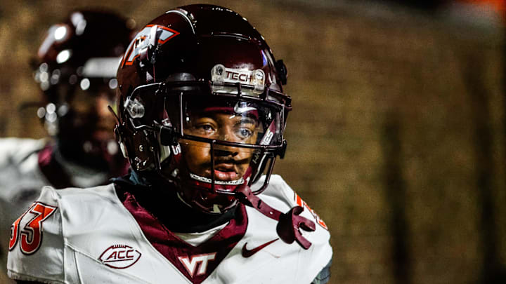 Nov 23, 2024; Durham, North Carolina, USA; Virginia Tech Hokies running back Bhayshul Tuten (33) runs onto the field prior to the game against Duke Blue Devils at Wallace Wade Stadium. Mandatory Credit: Jaylynn Nash-Imagn Images