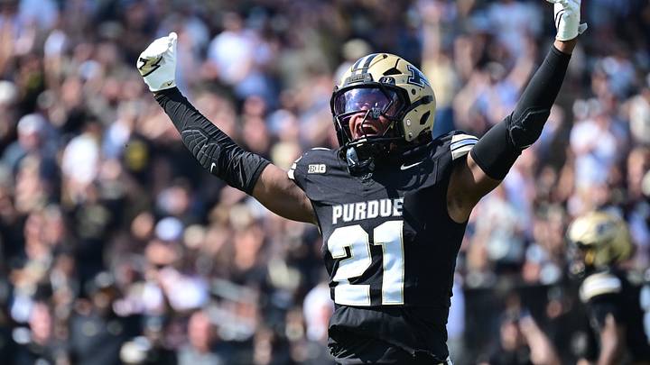 Purdue Boilermakers defensive back Justin Denson Jr. (21) motions to the crowd. Purdue Boilermakers defensive back Justin Denson Jr. (21) motions to the crowd.