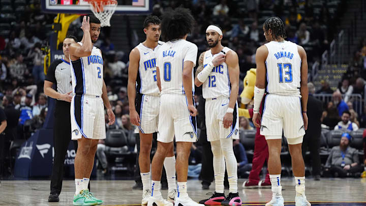 Feb 6, 2025; Denver, Colorado, USA; Orlando Magic guard Caleb Houstan (2), forward Tristan da Silva (23), guard Anthony Black (0), guard Trevelin Queen (12) and guard Jett Howard (13) huddle in the fourth quarter against the Denver Nuggets at Ball Arena. Mandatory Credit: Ron Chenoy-Imagn Images