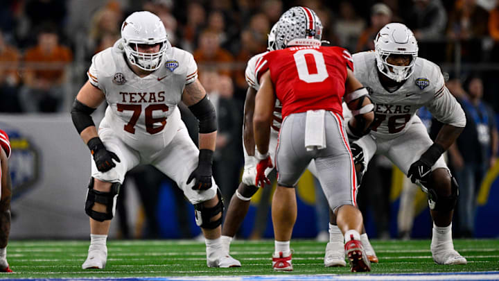 Jan 10, 2025; Arlington, TX, USA; Texas Longhorns offensive lineman Hayden Conner (76) and offensive lineman Kelvin Banks Jr. (78) and Ohio State Buckeyes linebacker Cody Simon (0) in action during the game between the Texas Longhorns and the Ohio State Buckeyes at AT&T Stadium. Mandatory Credit: Jerome Miron-Imagn Images