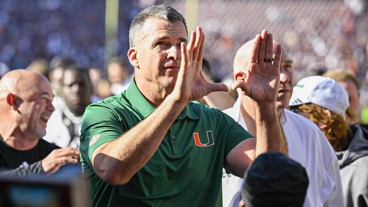 Dec 20, 2025; College Station, TX, USA; Miami Hurricanes head coach Mario Cristobal celebrates as he walks off the field after the Hurricanes win over the Texas A&M Aggies at Kyle Field. Mandatory Credit: Jerome Miron-Imagn Images