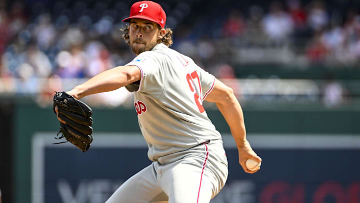 Aug 17, 2025; Washington, District of Columbia, USA; Philadelphia Phillies starting pitcher Aaron Nola (27) throws to the Washington Nationals during the first inning at Nationals Park. Aug 17, 2025; Washington, District of Columbia, USA; Philadelphia Phillies starting pitcher Aaron Nola (27) throws to the Washington Nationals during the first inning at Nationals Park.