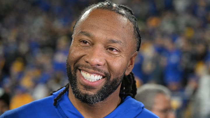 Oct 24, 2024; Pittsburgh, Pennsylvania, USA; Former Pittsburgh Panthers wide receiver Larry Fitzgerald reacts on the sideline against the Syracuse Orange during the second half at Acrisure Stadium. Mandatory Credit: Barry Reeger-Imagn Images