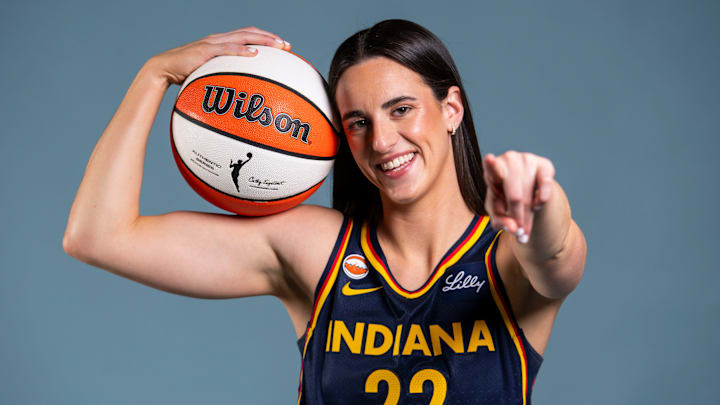 Indiana Fever guard Caitlin Clark (22) poses for a photo Wednesday, April 22, 2026, during media day at Gainbridge Fieldhouse in Indianapolis.