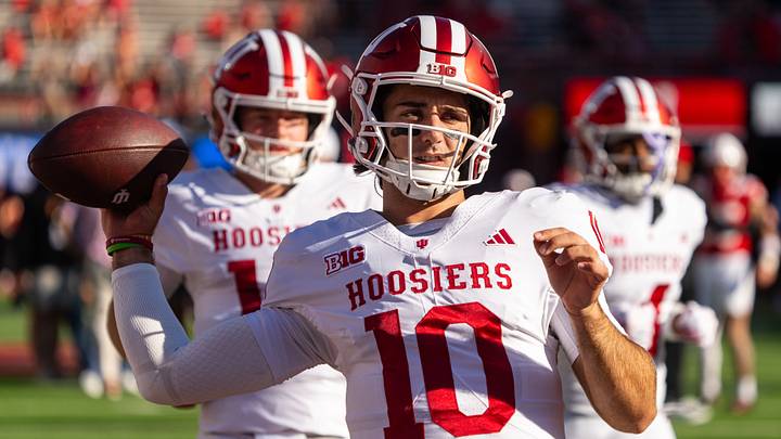 Oct 10, 2026; Lincoln, Nebraska, USA;  Indiana Hoosiers quarterback Josh Hoover (10) warms up before the game against the Nebraska Cornhuskers at Memorial Stadium.  Mandatory Credit: Dylan Widger-Imagn Images