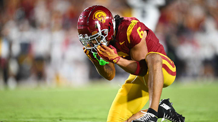 Sep 7, 2024; Los Angeles, California, USA; USC Trojans wide receiver Makai Lemon (6) reacts after missing a catch in the end zone against the Utah State Aggies during the second quarter at United Airlines Field at Los Angeles Memorial Coliseum. Mandatory Credit: Jonathan Hui-Imagn Images