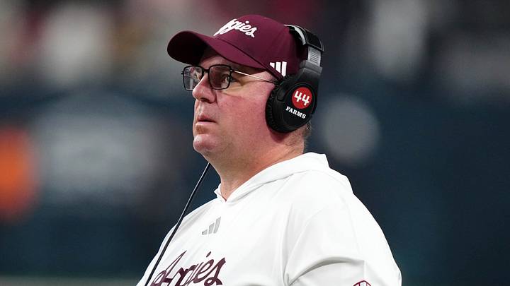Dec 27, 2024; Las Vegas, NV, USA; Texas A&M Aggies head coach Mike Elko reacts against the Southern California Trojans in the second half at Allegiant Stadium. Mandatory Credit: Kirby Lee-Imagn Images Dec 27, 2024; Las Vegas, NV, USA; Texas A&M Aggies head coach Mike Elko reacts against the Southern California Trojans in the second half at Allegiant Stadium. Mandatory Credit: Kirby Lee-Imagn Images