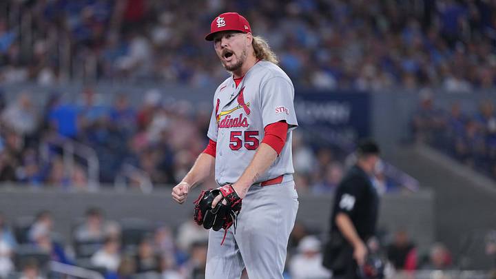 Aug 2, 2026; Toronto, Ontario, CAN; St. Louis Cardinals relief pitcher Ryne Stanek (55) reacts after getting the third out against the Toronto Blue Jays during the seventh inning at Rogers Centre. Mandatory Credit: Nick Turchiaro-Imagn Images