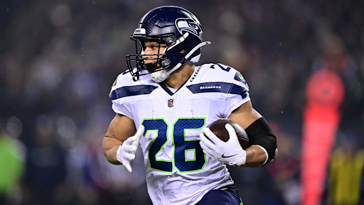 Dec 26, 2024; Chicago, Illinois, USA; Seattle Seahawks running back Zach Charbonnet (26) runs the ball against the Chicago Bears during the first quarter at Soldier Field. Mandatory Credit: Daniel Bartel-Imagn Images Dec 26, 2024; Chicago, Illinois, USA; Seattle Seahawks running back Zach Charbonnet (26) runs the ball against the Chicago Bears during the first quarter at Soldier Field. Mandatory Credit: Daniel Bartel-Imagn Images