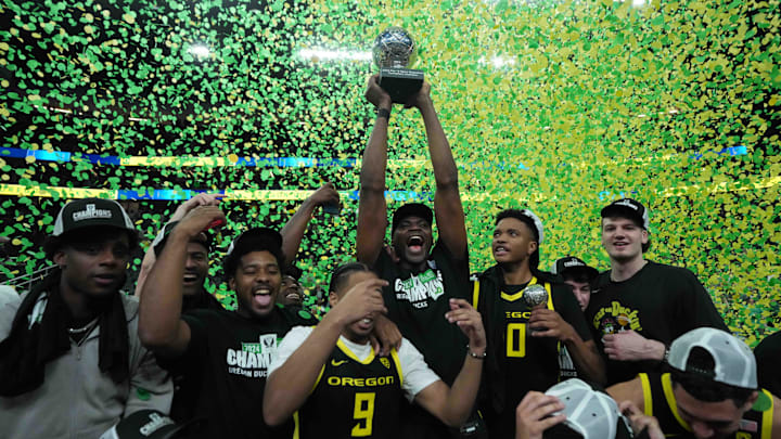 Oregon Ducks players celebrate after the Pac-12 Championship game