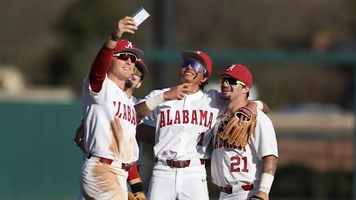 Alabama Crimson Tide baseball players smiling together.
