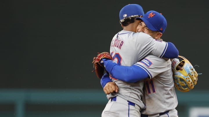 Jun 5, 2024; Washington, District of Columbia, USA; New York Mets shortstop Francisco Lindor (12) celebrates with Mets shortstop Jose Iglesias (11) after the final out against the Washington Nationals at Nationals Park. Mandatory Credit: Geoff Burke-USA TODAY Sports Jun 5, 2024; Washington, District of Columbia, USA; New York Mets shortstop Francisco Lindor (12) celebrates with Mets shortstop Jose Iglesias (11) after the final out against the Washington Nationals at Nationals Park. Mandatory Credit: Geoff Burke-USA TODAY Sports
