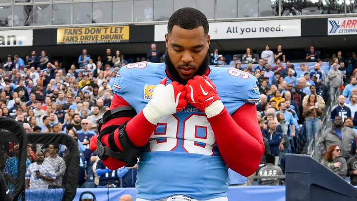 Tennessee Titans defensive tackle Jeffery Simmons stands during the National Anthem against the Houston Texans Tennessee Titans defensive tackle Jeffery Simmons stands during the National Anthem against the Houston Texans